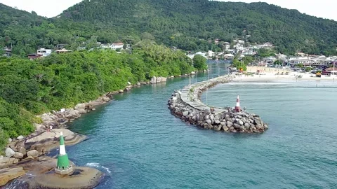 Farol da Barra lighthouse and channel at Barra da Lagoa, Florianopolis. Stock Footage 314531390