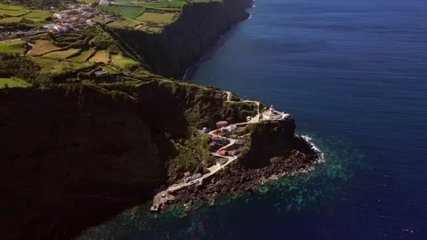 Farol do Arnel Light house Sao Miguel Azores Portugal drone Stock Footage 284723140