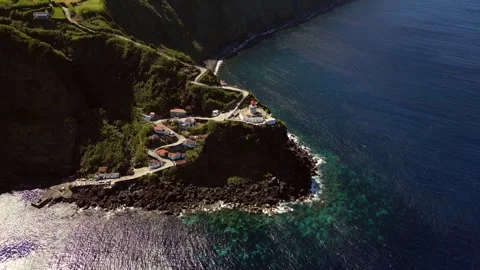 Farol do Arnel Light house Sao Miguel Azores Portugal drone Stock Footage 284723209