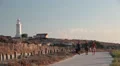 Faros Beach place, Paphos, Cyprus. Way for people only along sea and lighthouse HD Footage