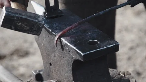 Farrier bend metal in slow motion Stock Footage 77010963