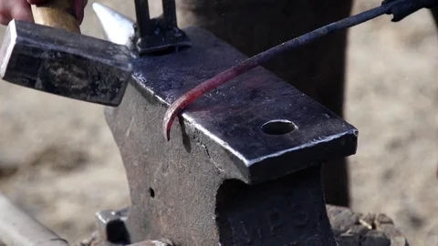 Farrier working in slow motion Stock Footage 77010570