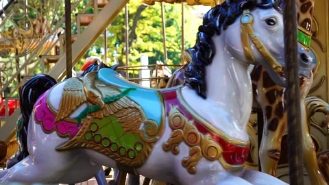 Fascinating close up view on vintage circus carousel retro merry go round horse Stock Footage 97295974