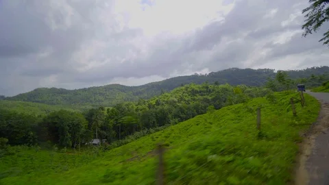 Fascinating plate side View on the road to tea plantation,  Sri Lanka Stock-Footage 107912467