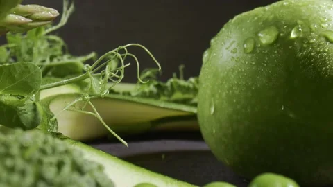 Fascinating probelens super closeup macro dolly shot of green fruit Stock Footage 153058797