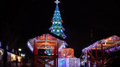 Fascinating steady view on cozy warm atmosphere of festive Christmas market Stock Footage 100142380
