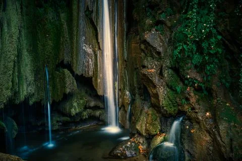 The fascinating waterfall in the forest Stock Photos