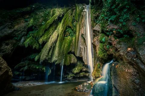 The fascinating waterfall in the forest Stock Photos