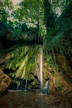 The fascinating waterfall in the forest Stock Photos