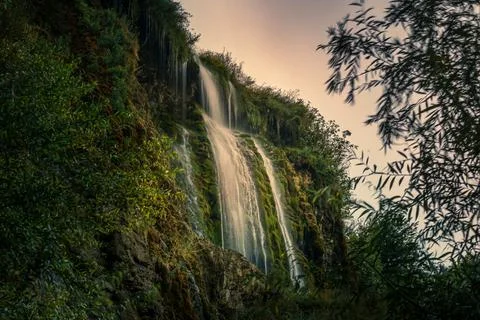 The fascinating waterfall in the forest Stock Photos