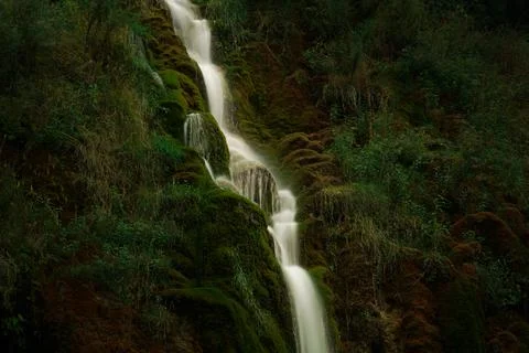 The fascinating waterfall in the forest Stock Photos