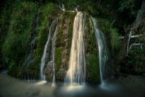 The fascinating waterfall in the forest Stock Photos
