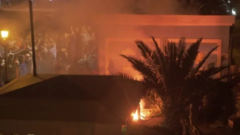 Fascists throw flares, projectiles attacking refugees who were peacefully Stock Footage 137923946