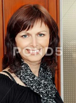Fashion beauty portrait of smilling middle age woman Stock Photos