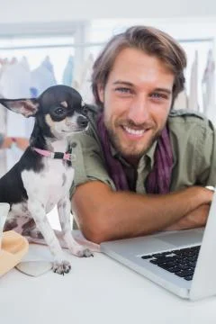 Fashion designer and little dog Stock Photos