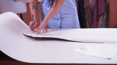 Fashion designer making new pattern Stock Footage 88393862