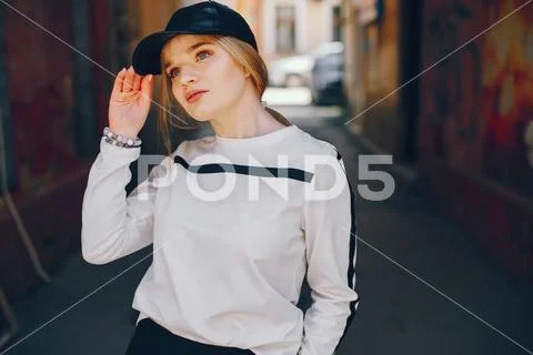 Fashion girl in a city Stock Photos
