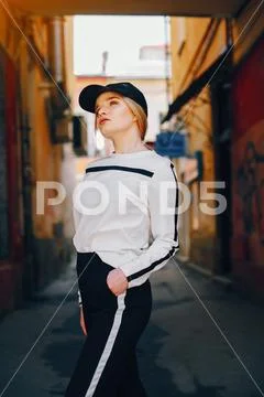 Fashion girl in a city Stock Photos