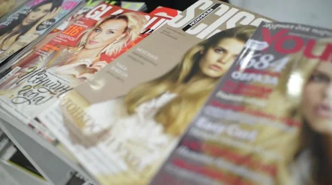 Fashion Glossy Magazines on the Shelf Stock Footage
