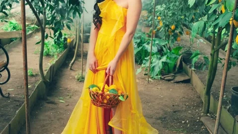 Fashion model posing, backdrop trees natural garden. fashion dress video 4k Stock Footage 234515749