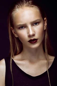 Fashion model is posing in studio for test photo shoot showing different poses Stock Photos