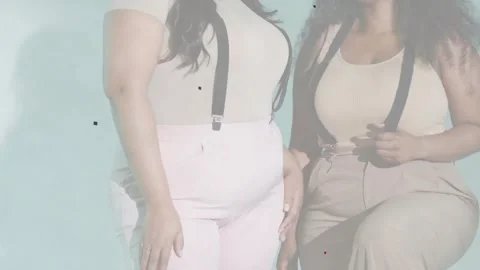 Fashion models posing, cam pullup, leg-up prop, tugging suspenders, smiling Stock Footage 330955814