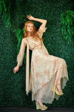 Fashion shot. Beautiful fashion model posing in modern bohemian style. Hippie Stock Photos