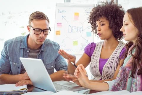 Fashion students using computer Foto stock