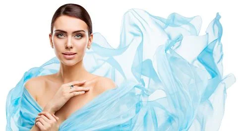 Fashion Woman Beauty with Full Gloss Lips wrapped in Soft Blue Chiffon Fabric Stock Photos