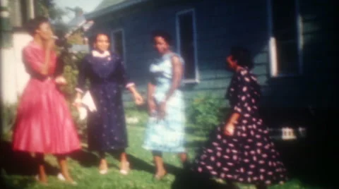 Fashionable African American women flirt with camera 1950s  home movie 3673 Stock Footage 68034318