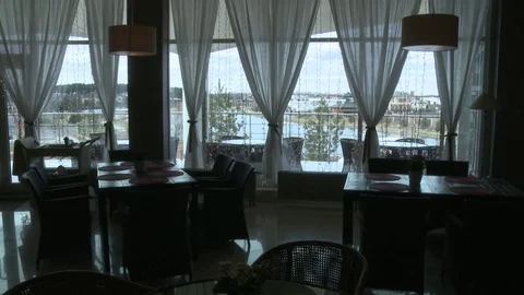 Fashionable cafe interior with panoramic windows Stock Footage 79554173