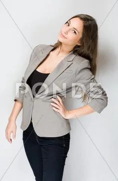 Fashionable young brunette woman. Stock Photos