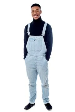Fashionable young guy posing to camera Stock Photos