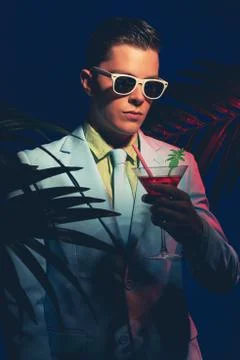 Fashionable Young Man Holding Cocktail Drink Stock Photos