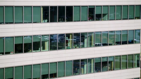 Fassade with refelctions of urban traffic Stock Footage 165500424