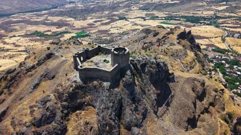 Fast Aerial Pullback and Ascent from Ancient Stone Fortress Stock Footage 339631821