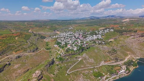 Fast Aerial Pullback Revealing Ancient Fortress, White Stone Town and River Stock Footage 341024744