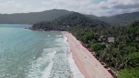 Fast and distant drone shot of a beach on koh phangan in daytime, thailand Stock Footage 278311378