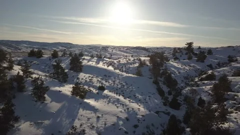 Fast and low flying over desert landscape in winter Stock Footage 166129457