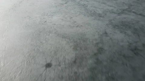 Fast and Speedy Close up drone view on ice on the lake or river Stock Footage 151920865