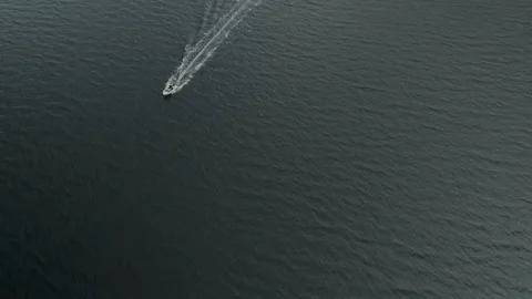 Fast Boat Approaching and Passing Under Drone Near Fornells, Menorca, Spain Stock-Footage 344417575