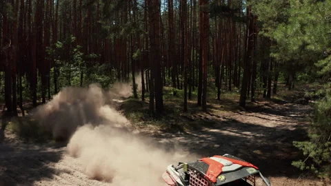 Fast buggy is driving with big clouds of dust. Stock Footage 136155860