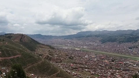Fast camera of city next to mountains Stock Footage 98614871