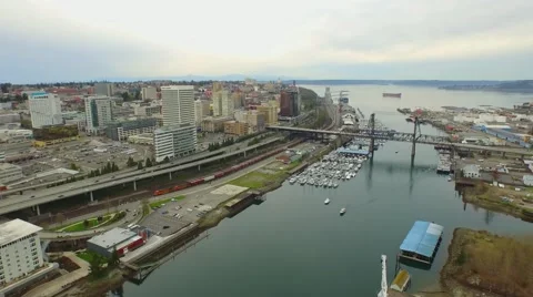 Fast camera fly-through a downtown office area by a river Stock-Footage 49217025