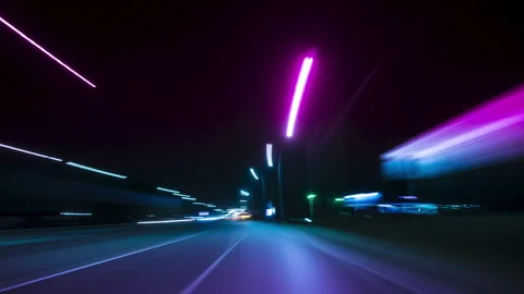 Fast Car Drive Through City at Night in Rays of Street Lights Timelapse. Stock Footage 331859175
