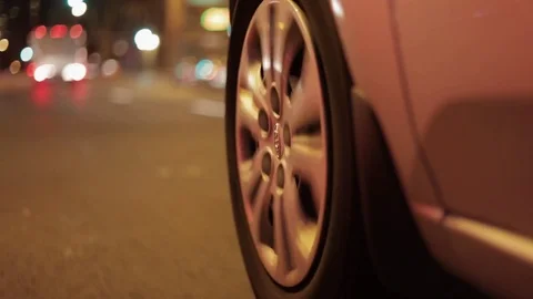 Fast car driving close up mount to tire speeding Stock Footage 75736595