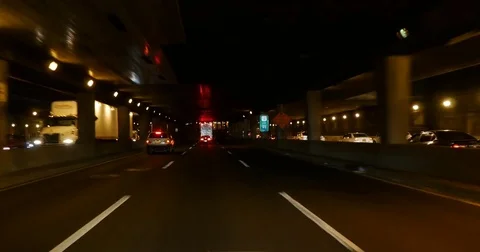 Fast Car Driving in Traffic at Night New York City 4K Stock Video Stock Footage 80442573