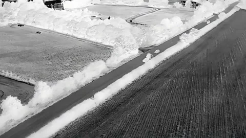 A Fast Car Overtaking During a Getaway Seen On a Genuine Thermal Imaging Camera Video stock 159705196