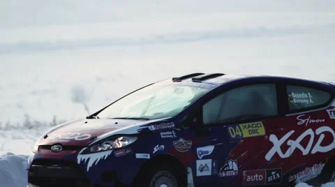 Fast car rides on rally road track in winter Stock Footage 59644488