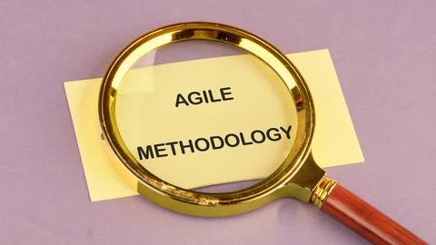 Fast changes concept. AGILE METHODOLOGY on the yellow card, top view 写真素材